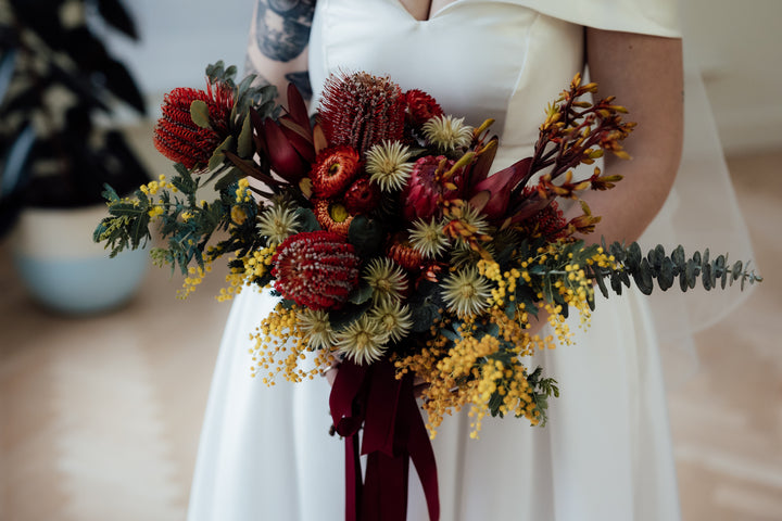 Native Australian flowers wedding bouqet, bride is wondering what to do with her wedding flowers after the big day.