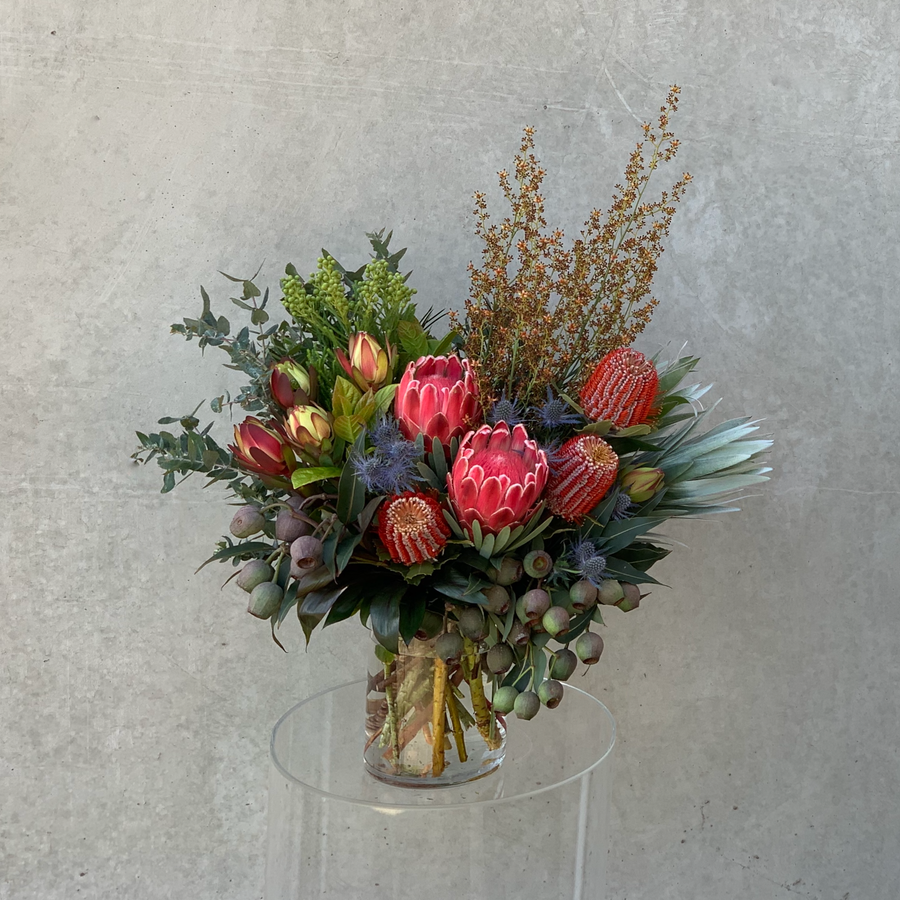 A vibrant arrangement of locally grown mixed native flowers & foliage