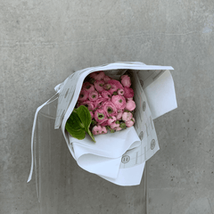 Pink ranunculus posy gift wrapped