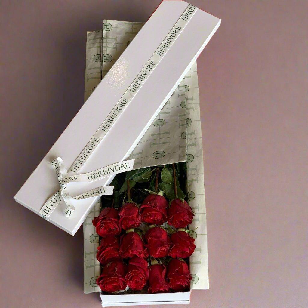 Presentation box of one dozen premium roses